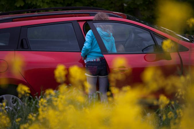 Girl getting into car