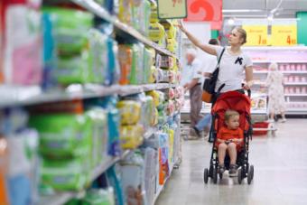 Mother with baby in supermarket