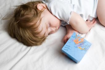 Sleeping Baby with Globe