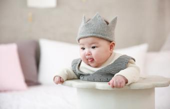 Cute baby boy on bed