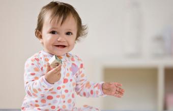 baby playing with blocks