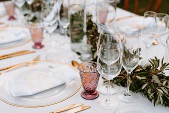 Boho Table Decoration with olive branches and rose drink glasses