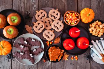 Variety of candied apples, cookies, candy and sweets for Halloween