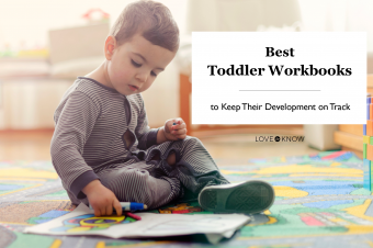 Toddler working with a workbook