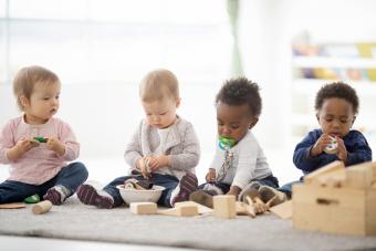 Group of babies playing together in daycare