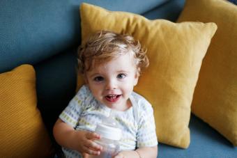 boy and his baby bottle