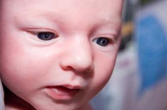 Closeup image of a newborn baby's face