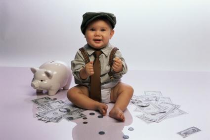 Baby counting piggybank money