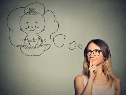 Woman dreaming of a baby