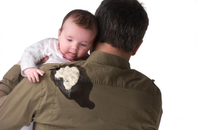 Father burping baby