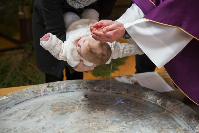 Baby being baptized