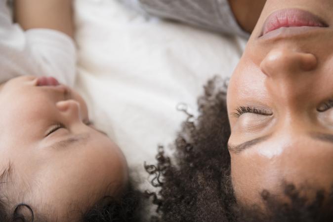 Mother and baby sleeping