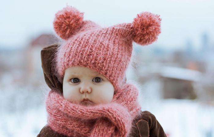 Little Girl Wearing a Hat and Scarf