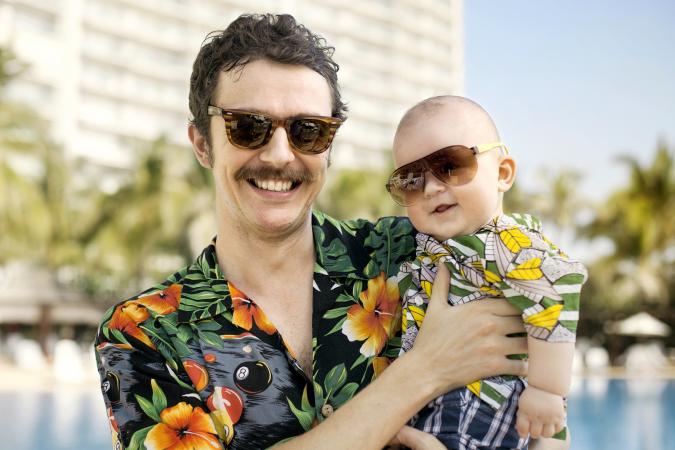 Father and his son with Hawaiian shirts