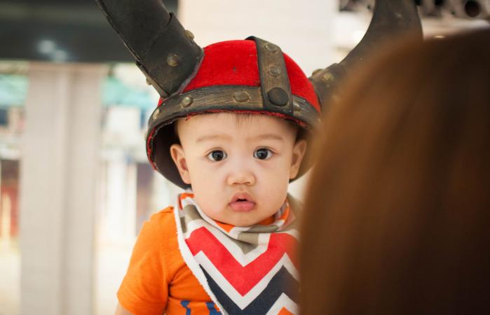 baby boy wearing a Viking hat