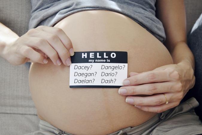 Name tag on a pregnant tummy