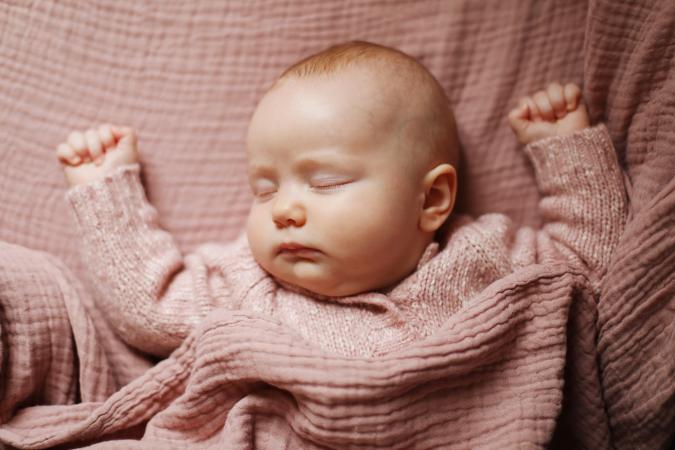 A 4 months old baby girl sleeping