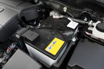 Battery under hood of car