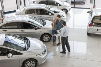 dealer showing new car