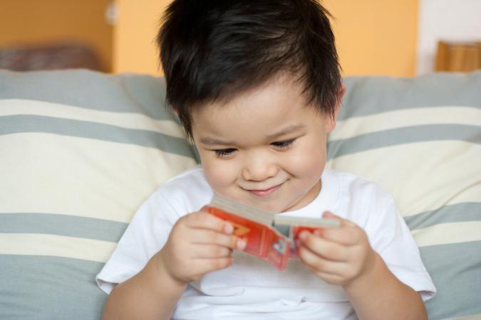 Boy with board book
