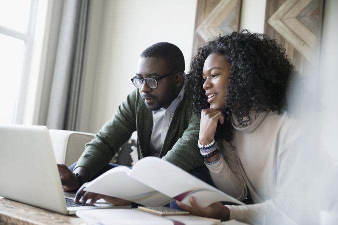 Couple reviewing investment portfolio