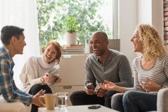 Friends hanging out playing Moods Board Game