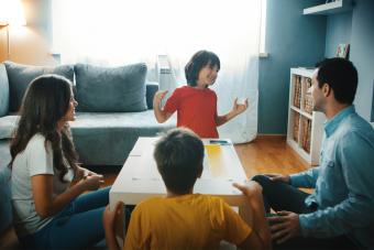 Family playing Moods Board Game
