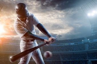Baseball player about to strike ball