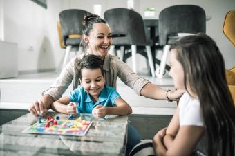 family playing board games toguether