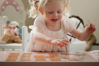 Young girl playing memory game