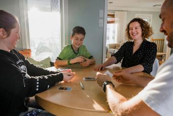 Family playing a board game