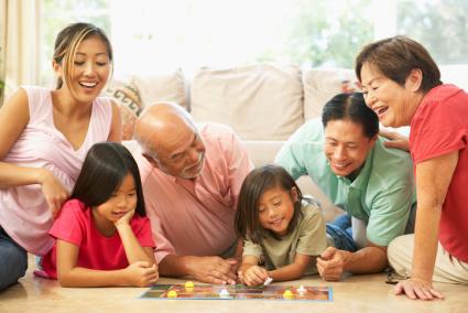 Family playing board game