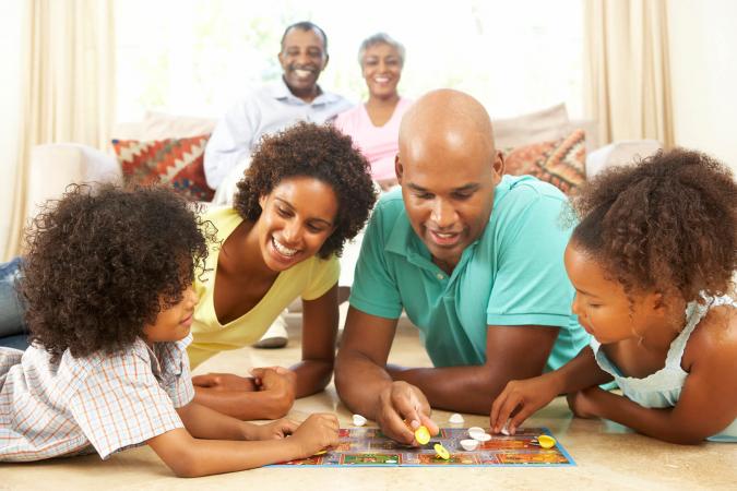 Family playing a board game