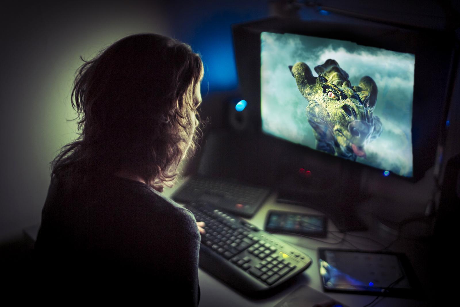 Gamer playing late at night