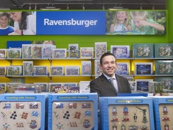 Thomas Kaeppeler surrounded by puzzles/games.