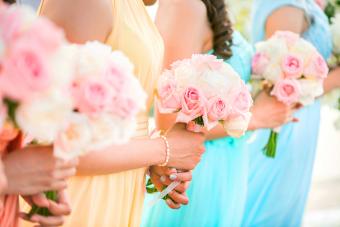 Bridesmaid holding a bouquet of roses at the wedding