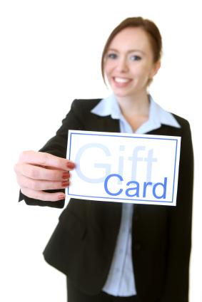 Business woman with gift card