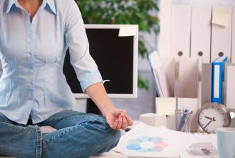 meditating at office desk