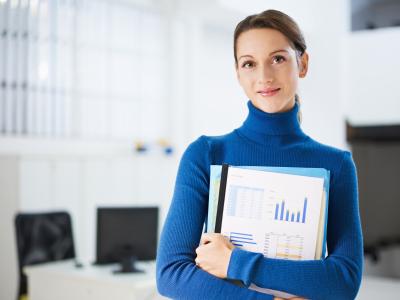 Woman holding a business report