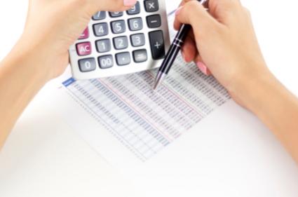 business woman reviewing financial document