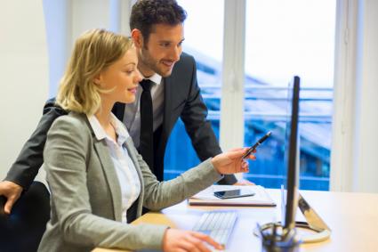 Business people on computer