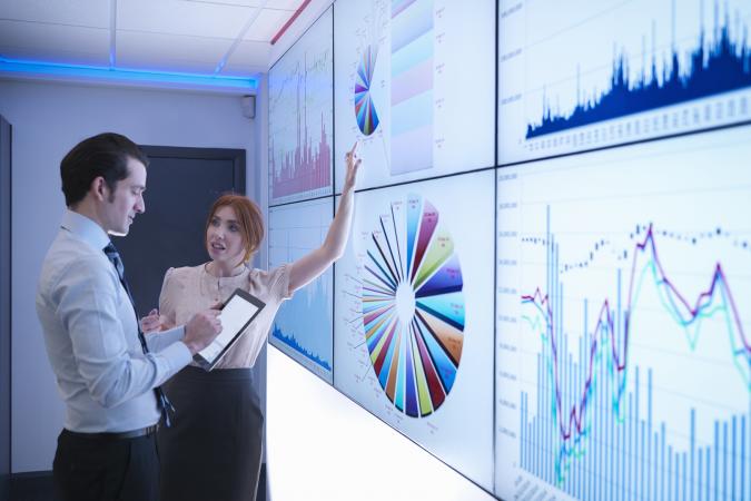 Colleagues Discussing Business Analytics