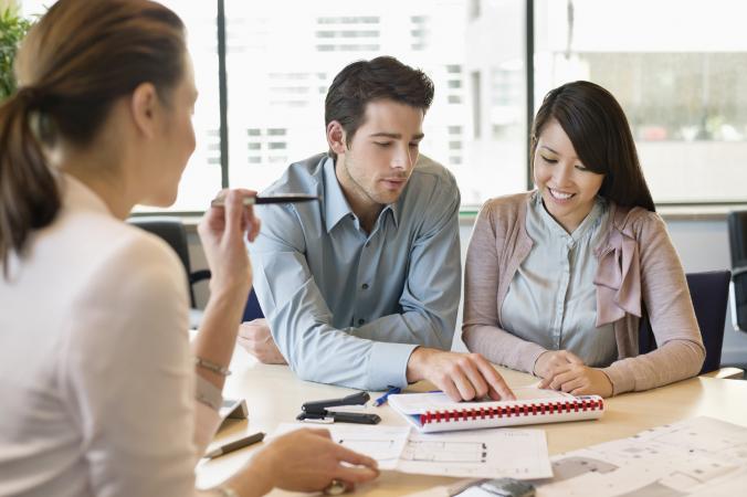 Business people discussing documents