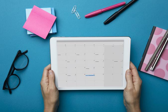 holding tablet with calendar