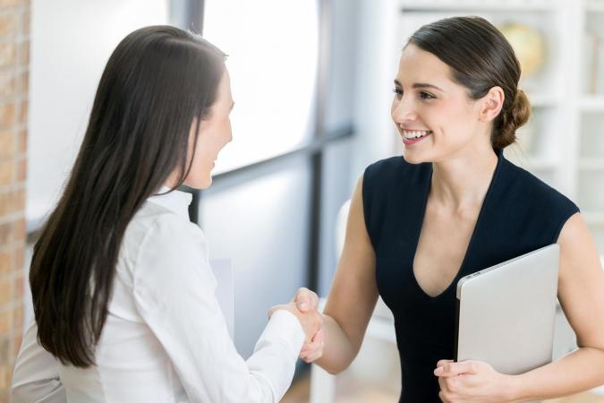 Saleswoman meeting with client