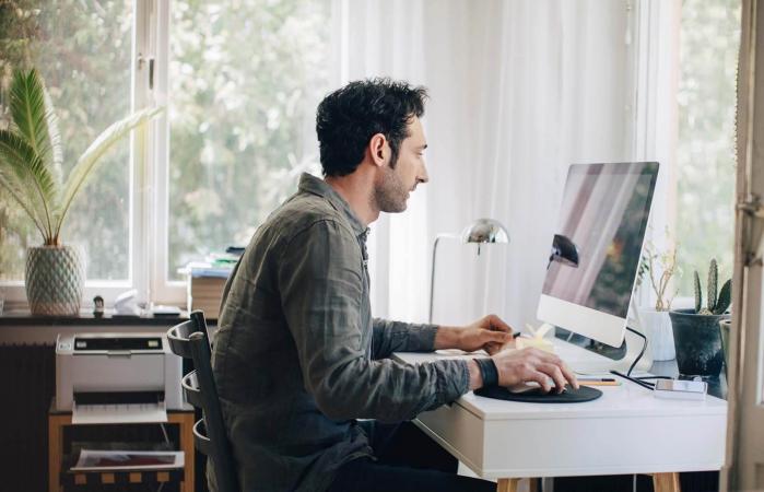 man in home office