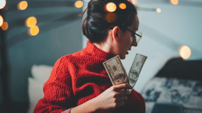 Woman holding cash