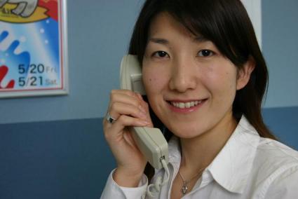 Customer service representative using phone skills
