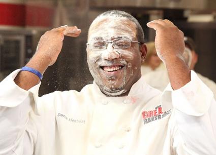 Chef Dana Herbert covered in flour