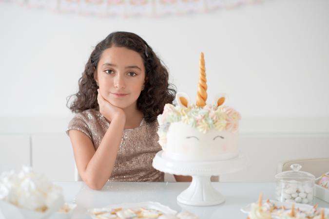 Birthday girl and unicorn cake